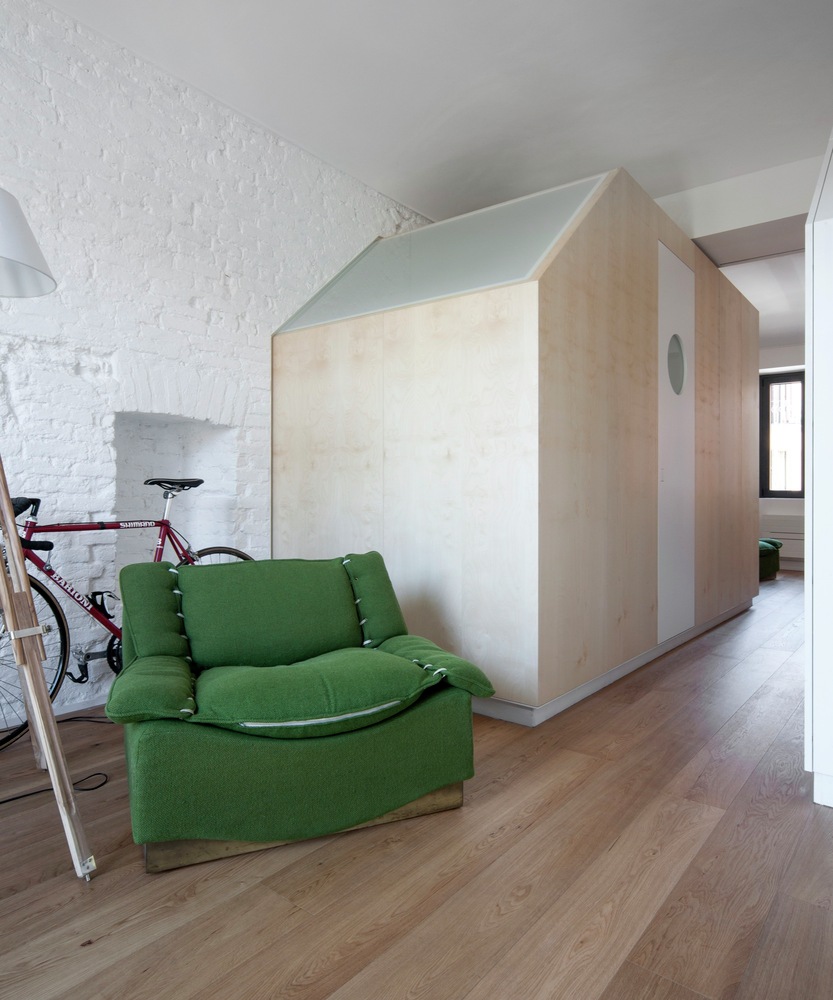 Turin apartment renovation wooden cube volume