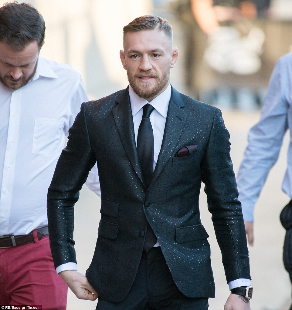The 27-year-old pictured suited and booted as he arrives at the 