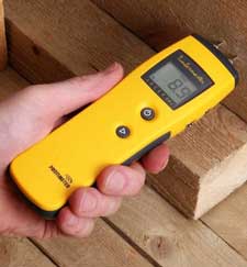 What is a pin-style moisture meter
